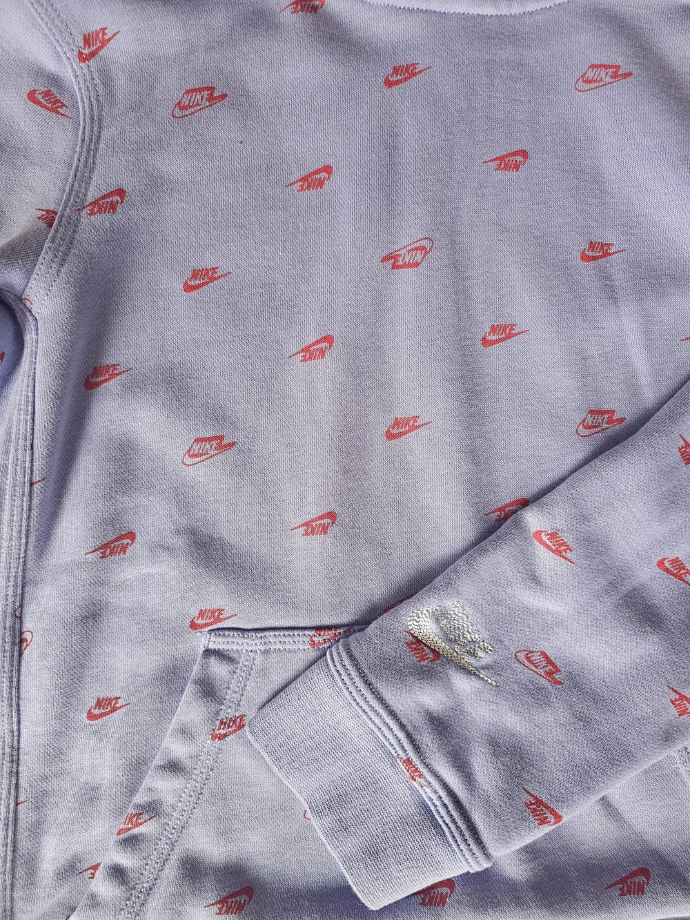Girls Nike Lilac Hoodie with Red Swoosh Pattern